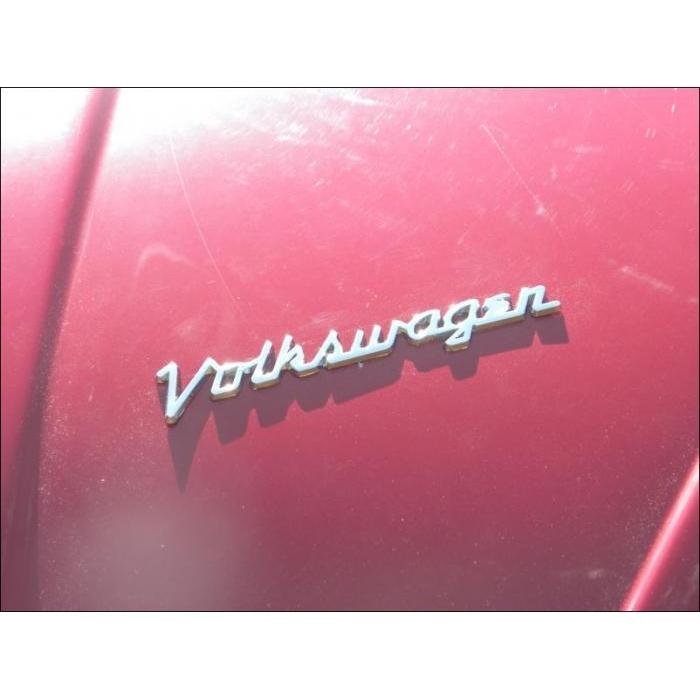 `Volkswagen` script embleem
