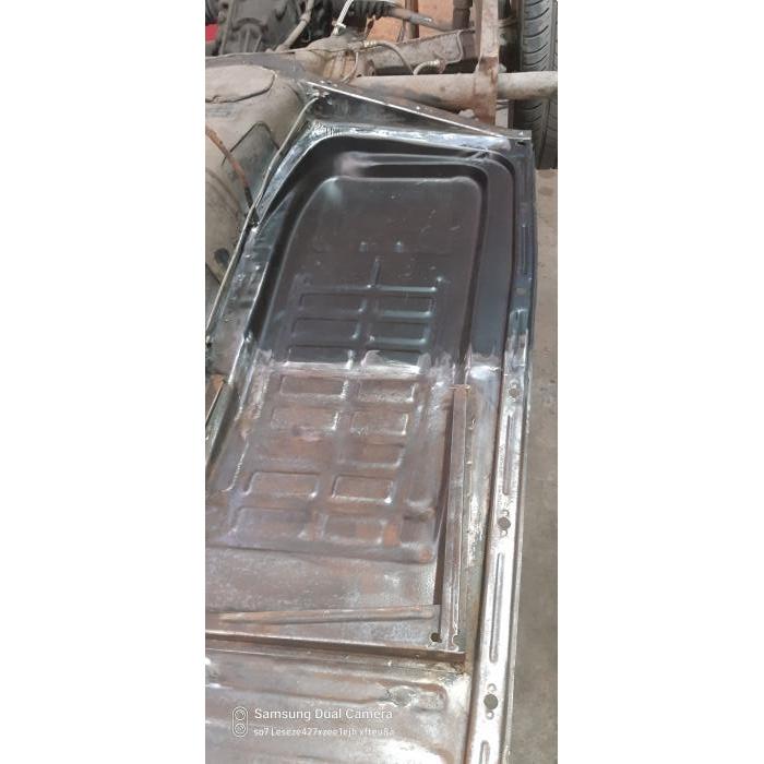 Half floorpan rear left (The color and/or treatment of the sheet metal part may differ from the picture)